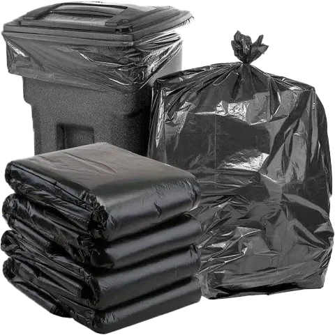 Black Cowboy garbage bags, filled and folded, beside a wheelie bin