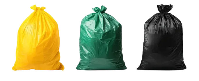 Yellow, green and black garbage bags tied at the top