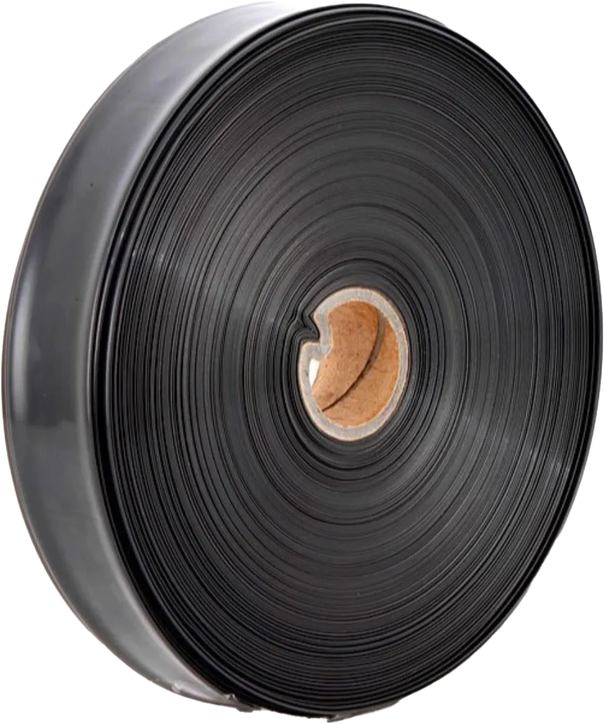 A large roll of black flat irrigation tubing