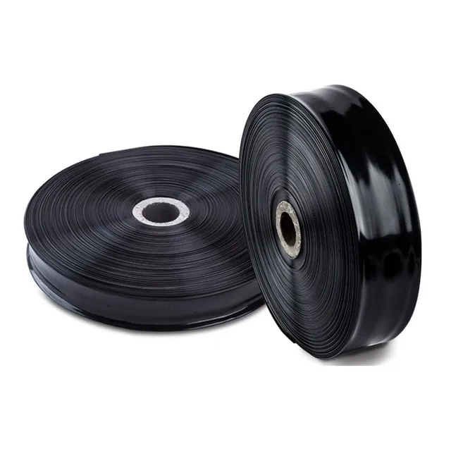 Two rolls of black flat irrigation hose