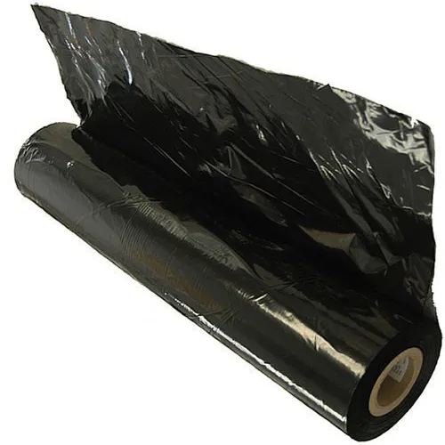 A roll of black polythene sheet partly unrolled