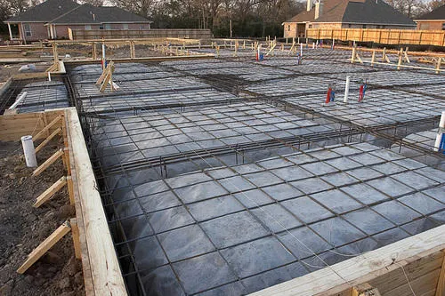 Black polythene sheet laid as a damp-proof layer on a building foundation