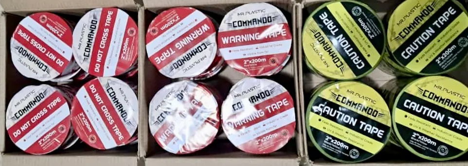 Open cartons of Commando warning and caution tape