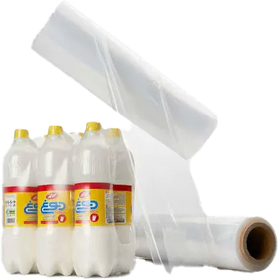 A multipack of bottles wrapped in shrink film beside a roll of film
